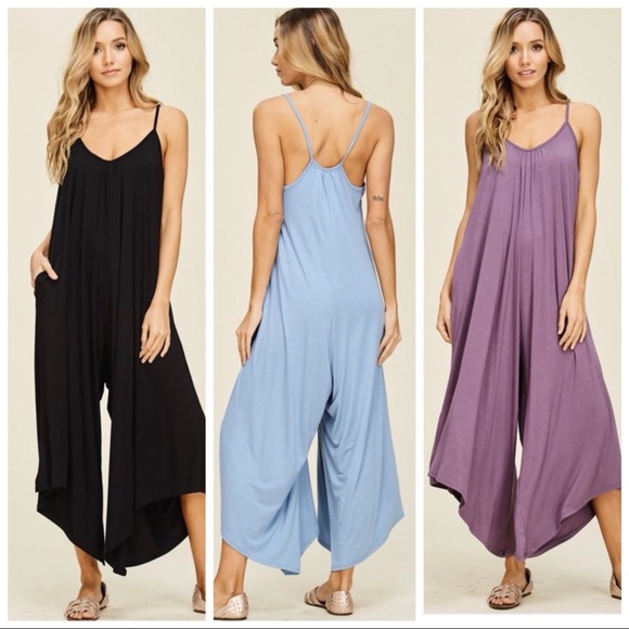 Pants - Loose fit jumpsuit with pockets.